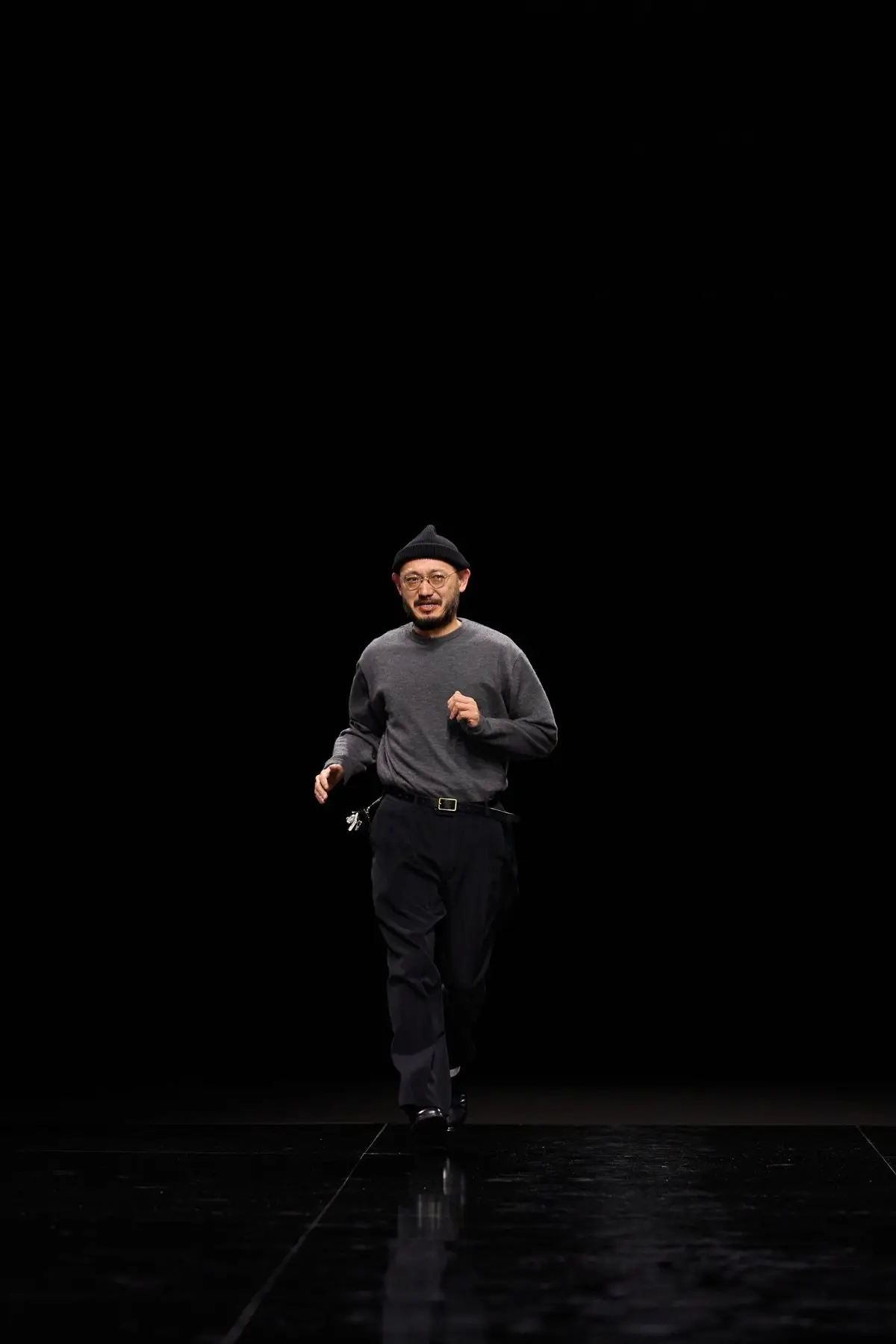The bow at Issey Miyake. Black trousers, near miss.
