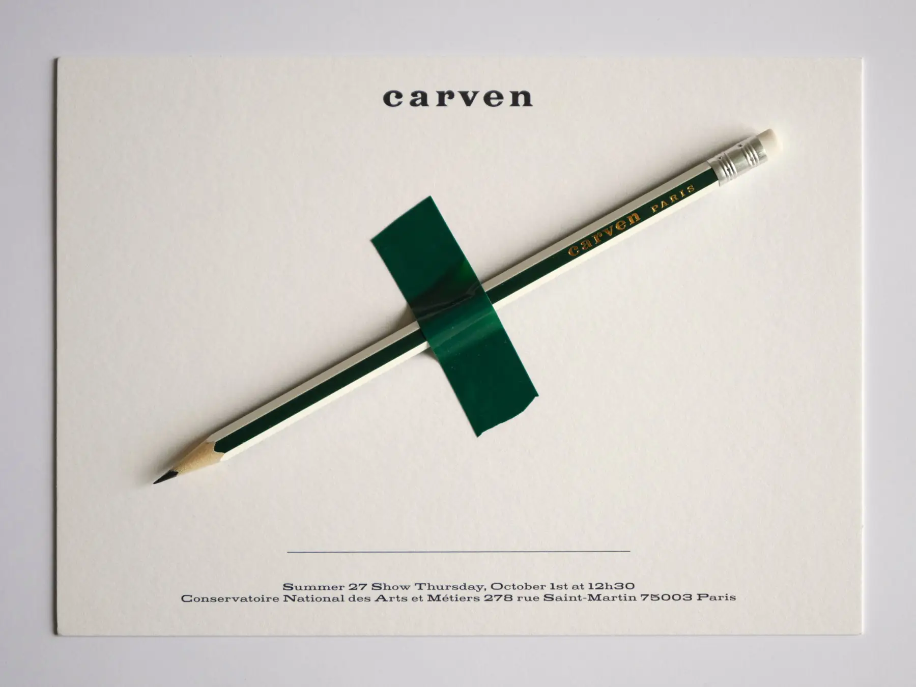 The invite. A striped pencil on a card.