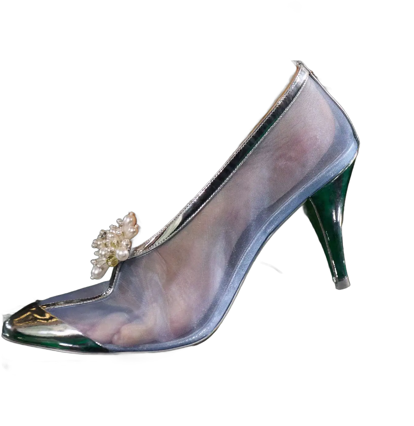 Chanel SS27, one of the 83 pairs. A silver heel, cut out.