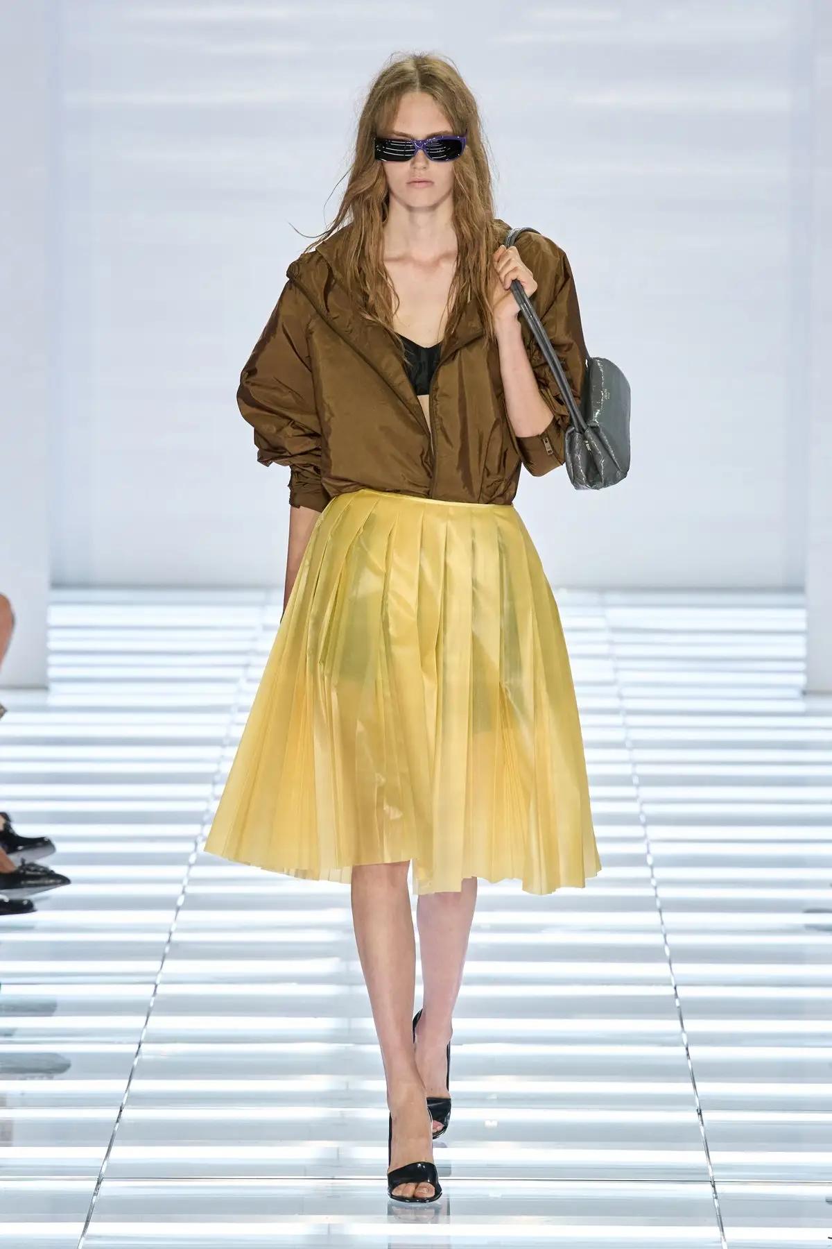 Prada SS27, Look 48. A yellow skirt with the crinoline worn on the outside.