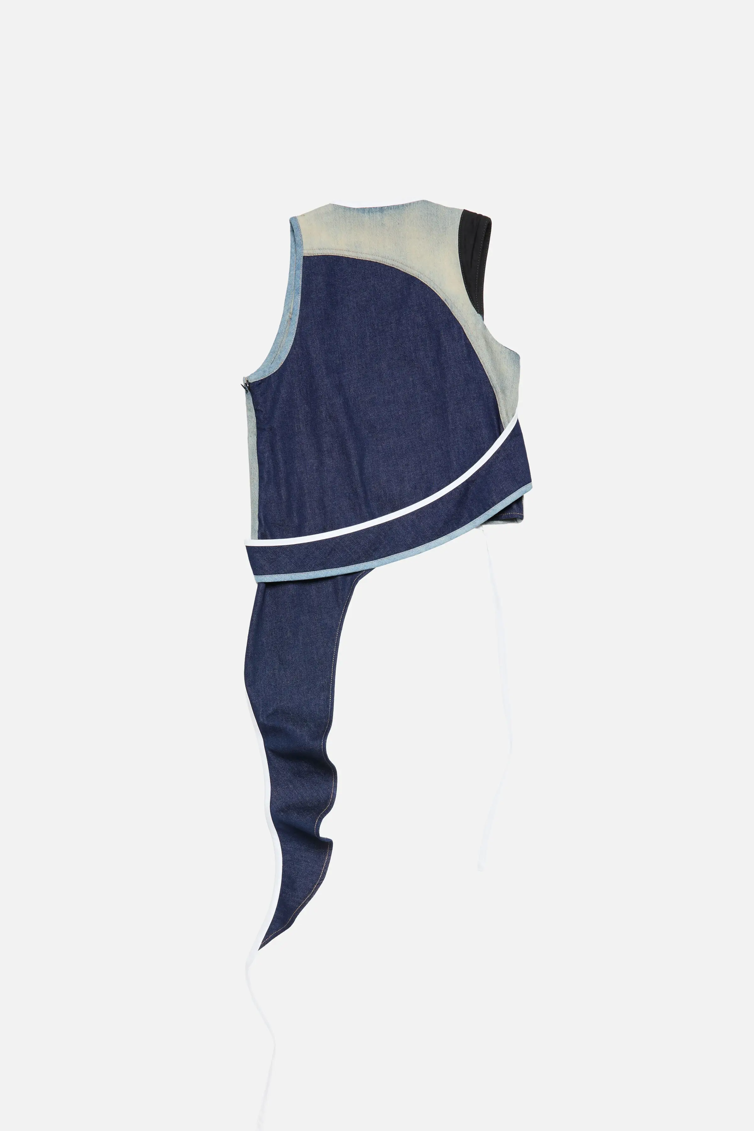 Asymmetrical Denim Vest. Patches outlined in white piping.